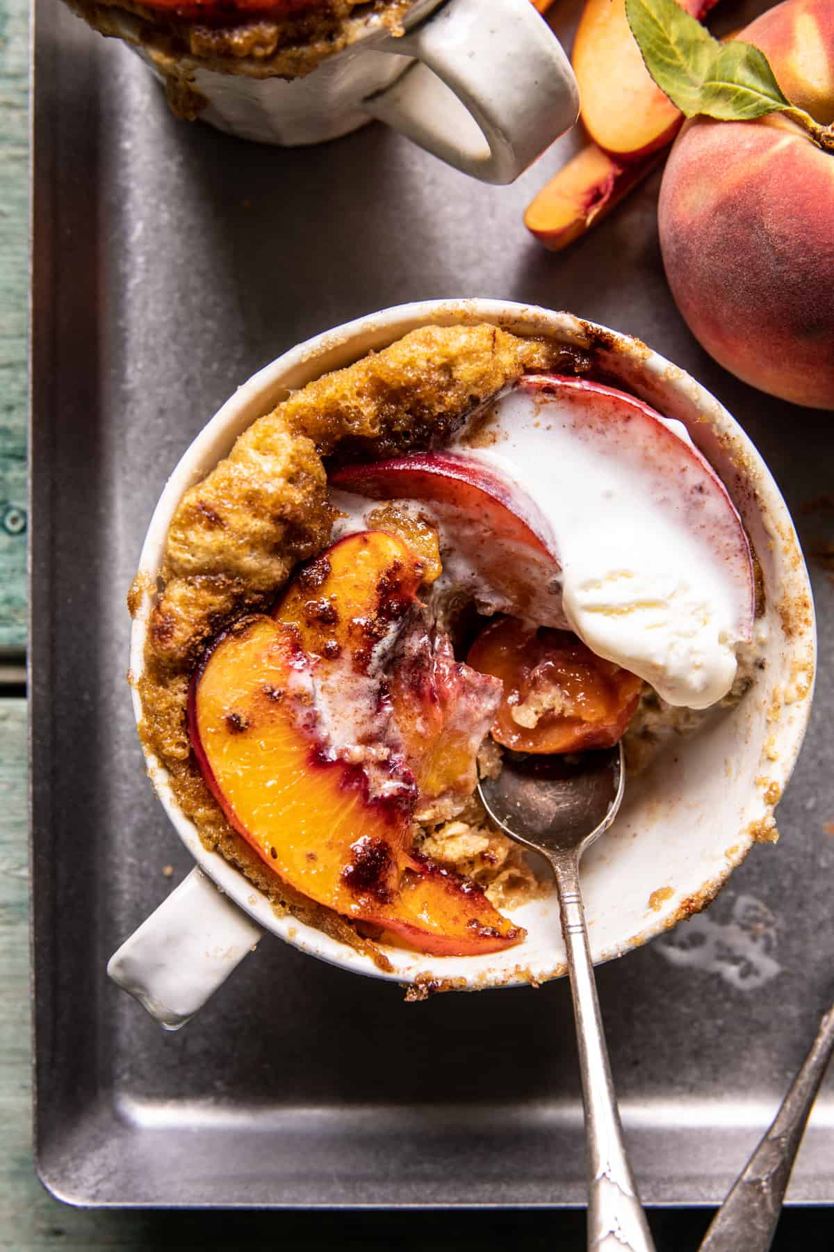 10 Minute Gooey Vanilla Peach Mug Cake | halfbakedharvest.com