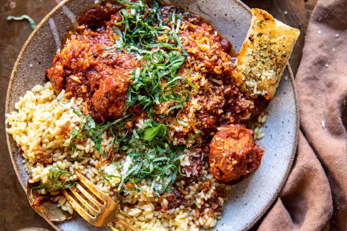 Saucy Braised Garlic Butter Meatballs with Orzo | halfbakedharvest.com