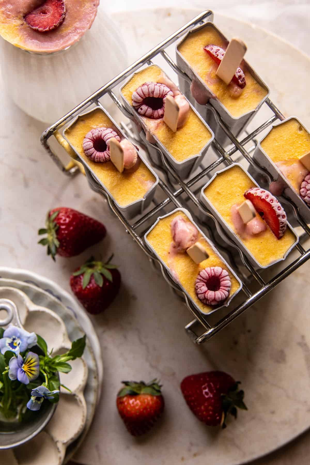 Creamy Strawberry Mango Popsicles | halfbakedharvest.com