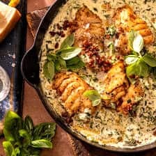 Garlic Butter Cod Florentine with White Wine Cream Sauce | halfbakedharvest.com