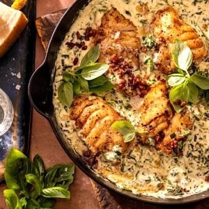 Garlic Butter Cod Florentine with White Wine Cream Sauce | halfbakedharvest.com