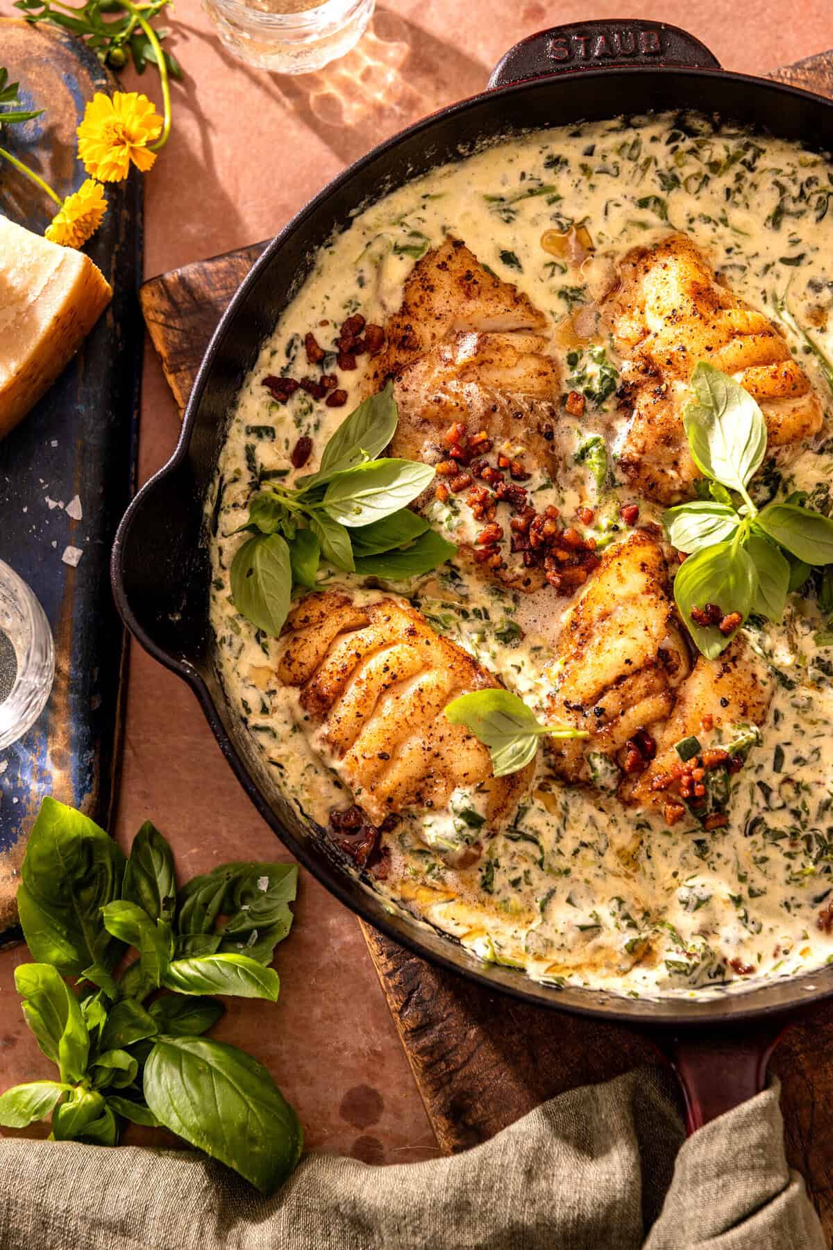 Garlic Butter Cod Florentine with White Wine Cream Sauce. - Half Baked ...