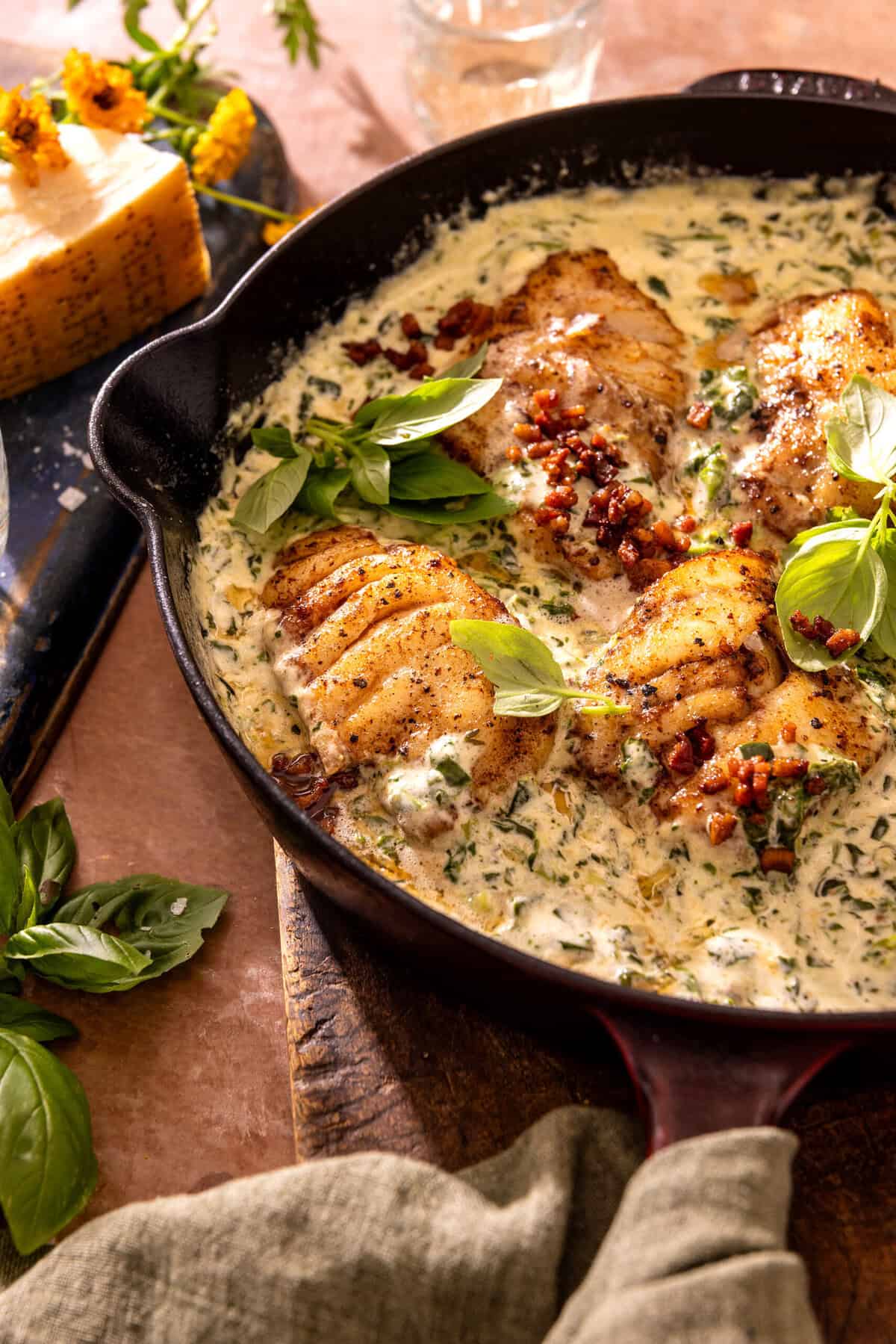 Garlic Butter Cod Florentine with White Wine Cream Sauce. - Half Baked ...