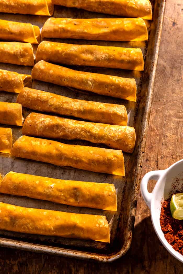 Baked Street Corn Dip Taquitos | halfbakedharvest.com