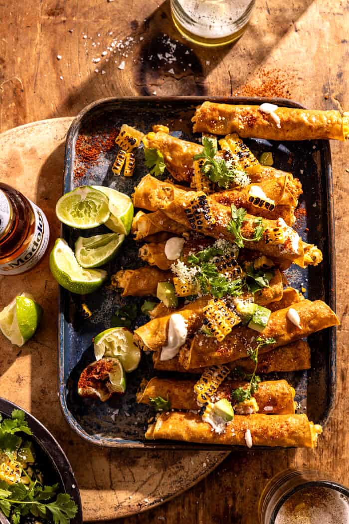 Baked Street Corn Dip Taquitos | halfbakedharvest.com