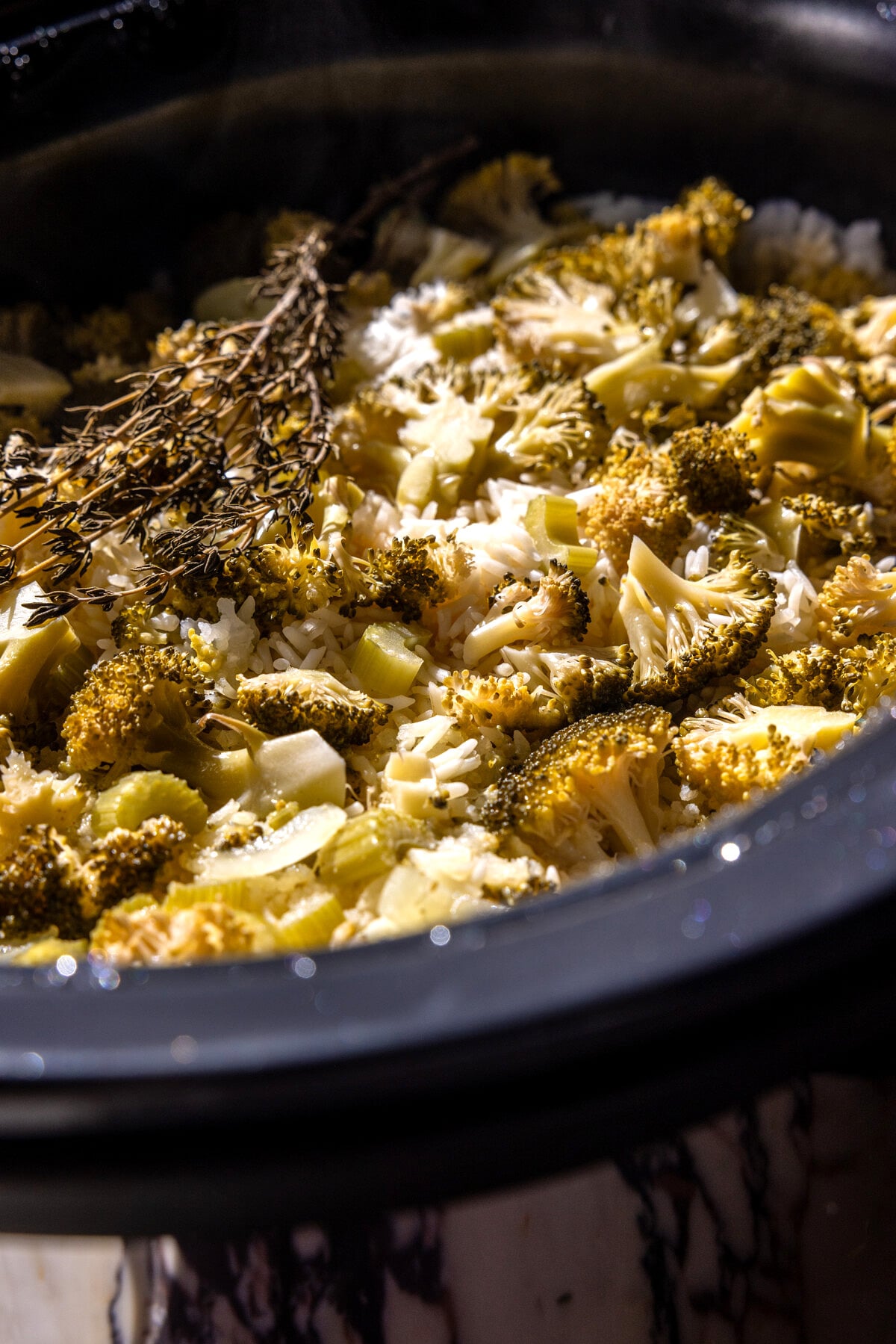 Crockpot Creamy Broccoli Cheddar Chicken Rice | halfbakedharvest.com